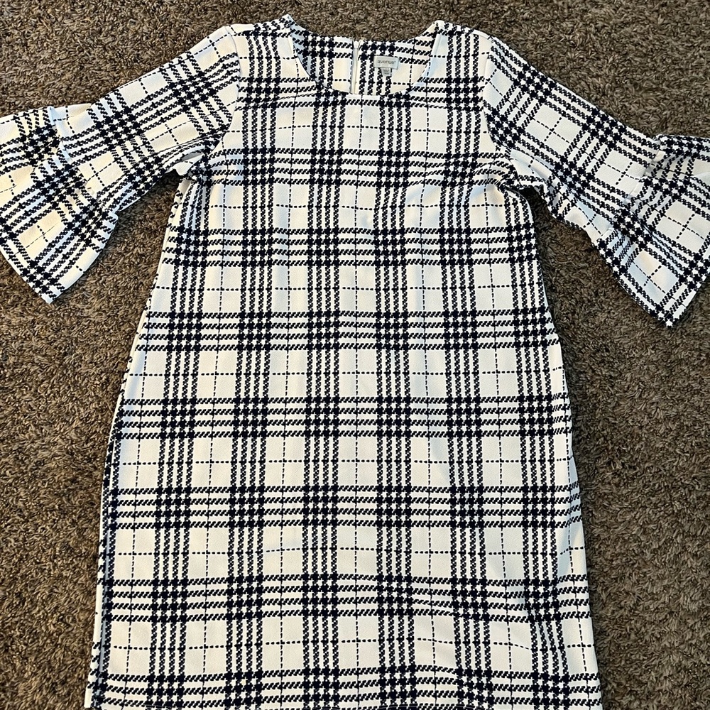 I patterned navy blue and white dress with a hidden zipper in the back.
